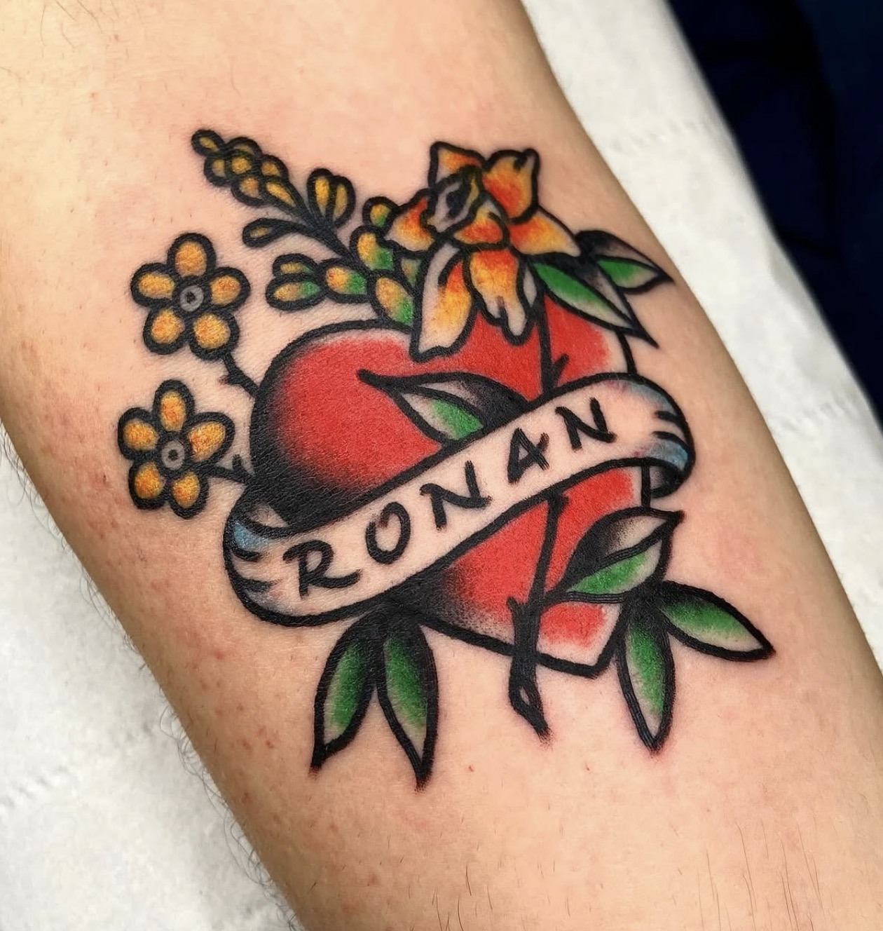 Traditional red heart with Ronan banner and flowers